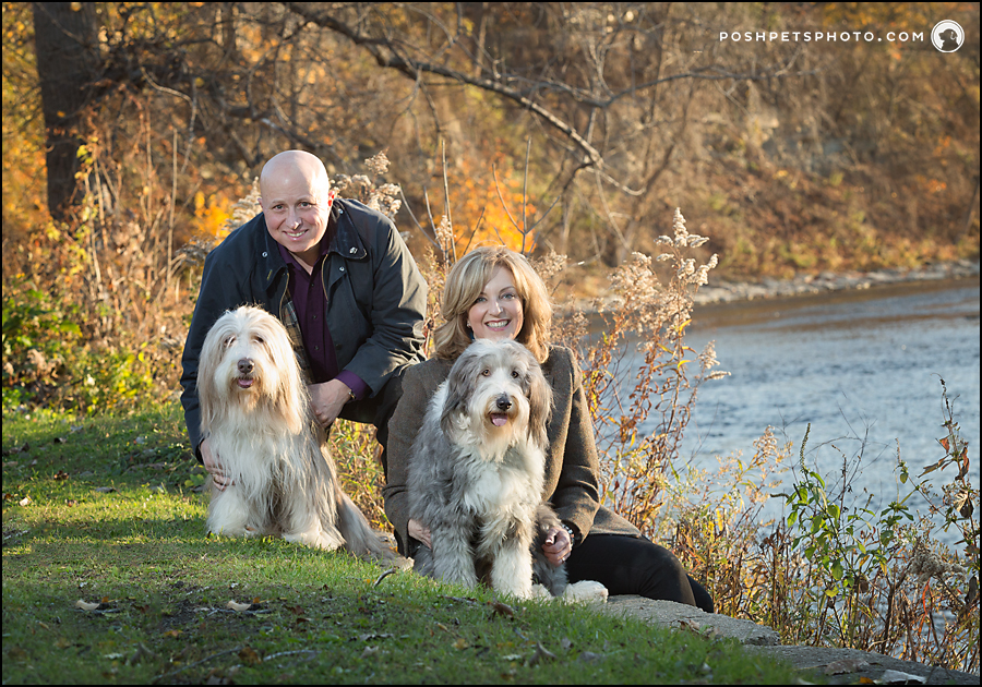 dog family by river in fall