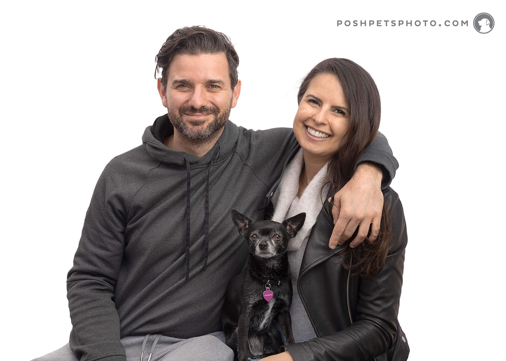 black chihuahua and couple
