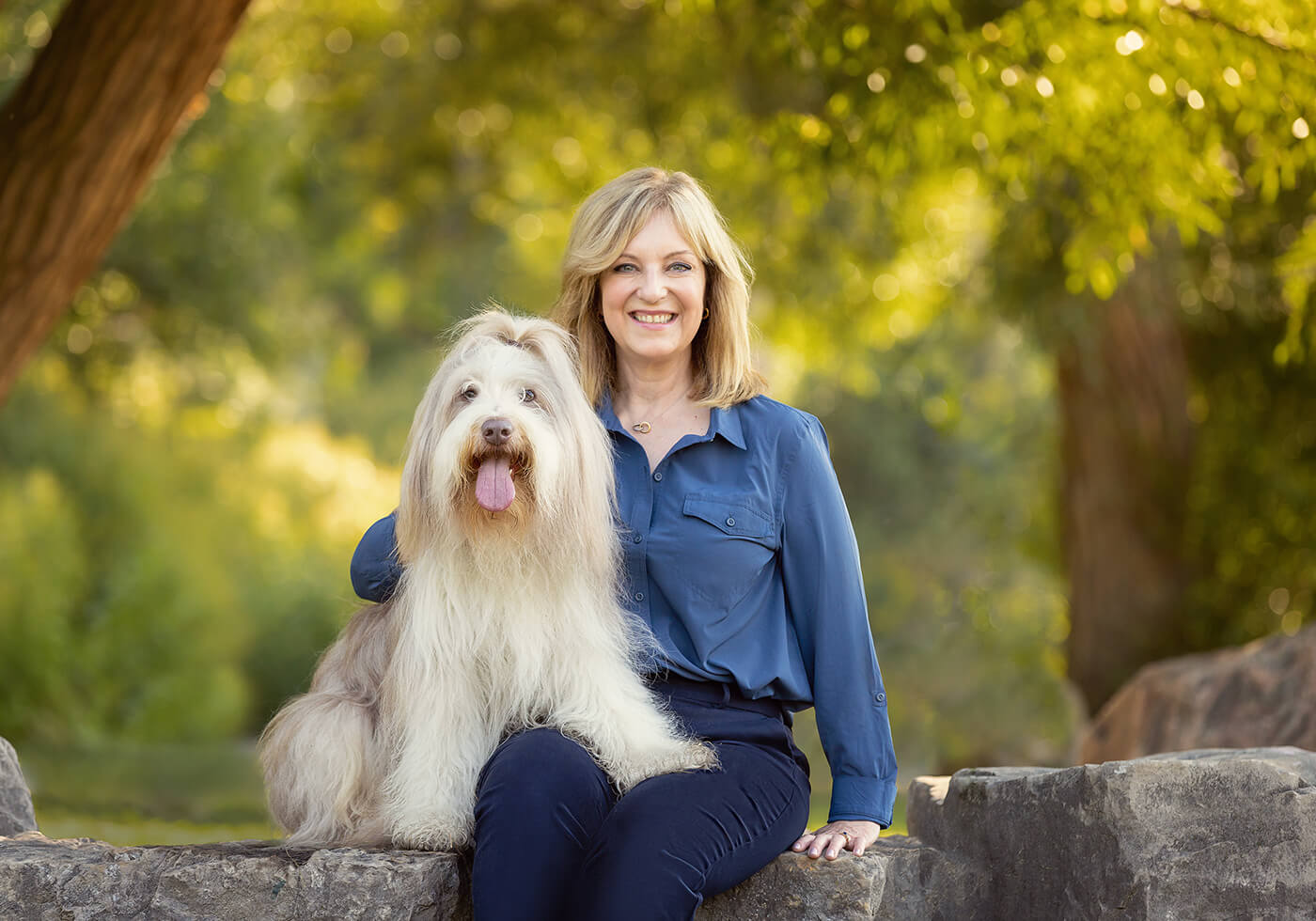 Portrait of dog mom and bearded collie dog.