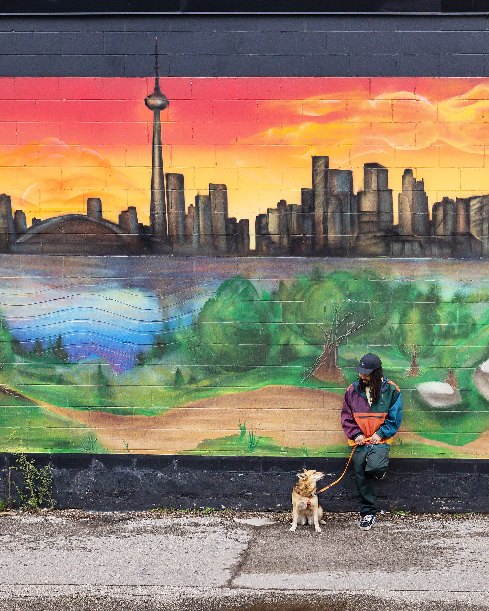 Sunny and Leyland Adams in front of his mural, CNIB Dreams